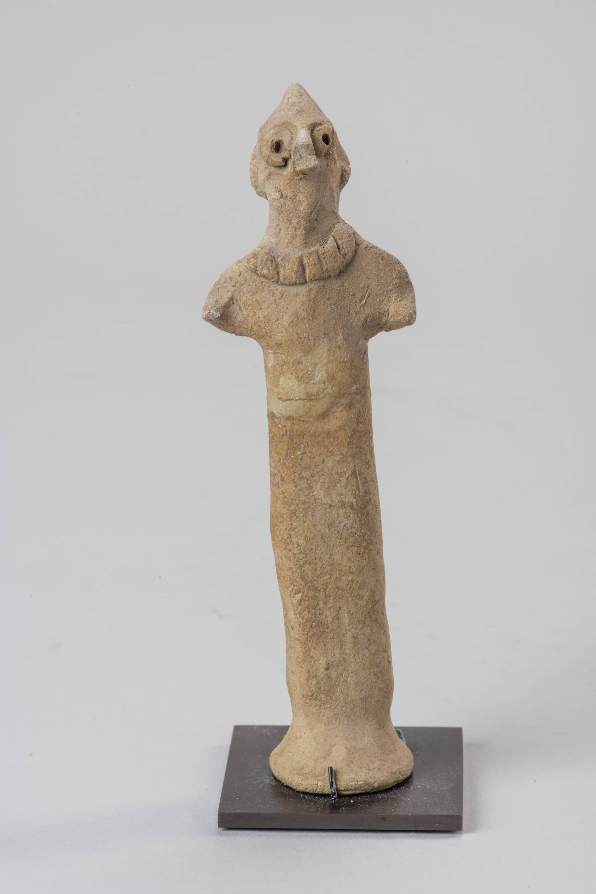 Figurine masculine à tête pointue