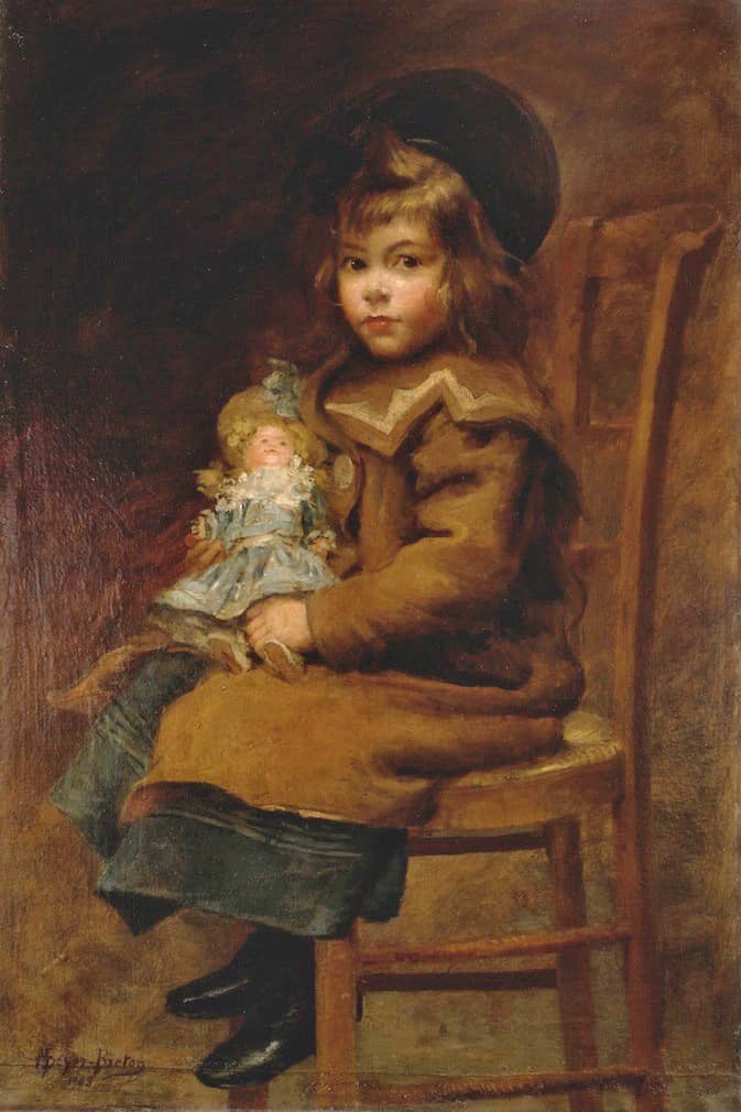 Portrait d’enfant et sa première poupée